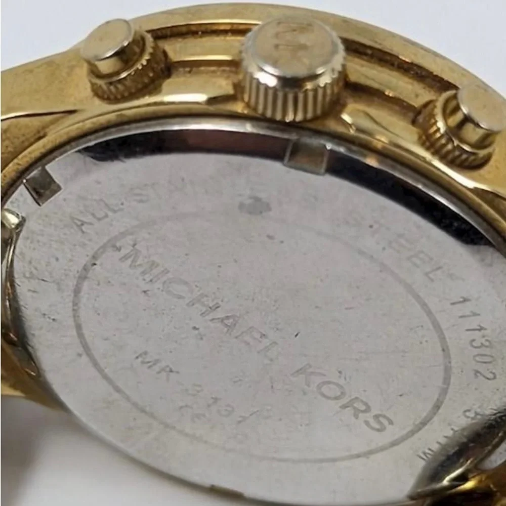 Michael Kors MK3131 Runway Twist gold chronograph bracelet watch